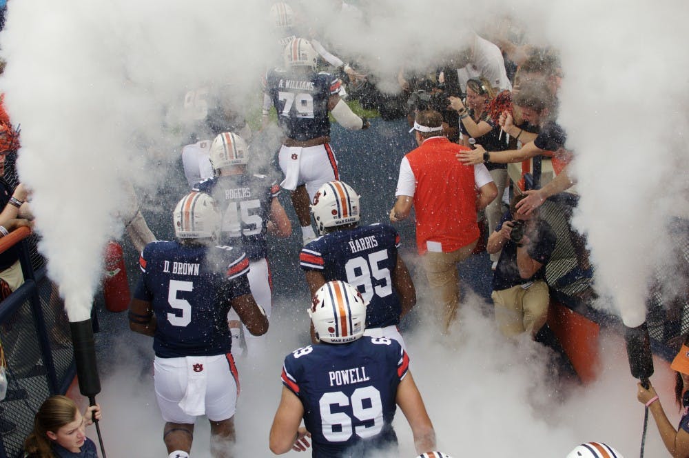The Auburn Tigers run on the field during Auburn Football vs. Mercer on Saturday, Sept. 16, 2017 in Auburn, Ala.