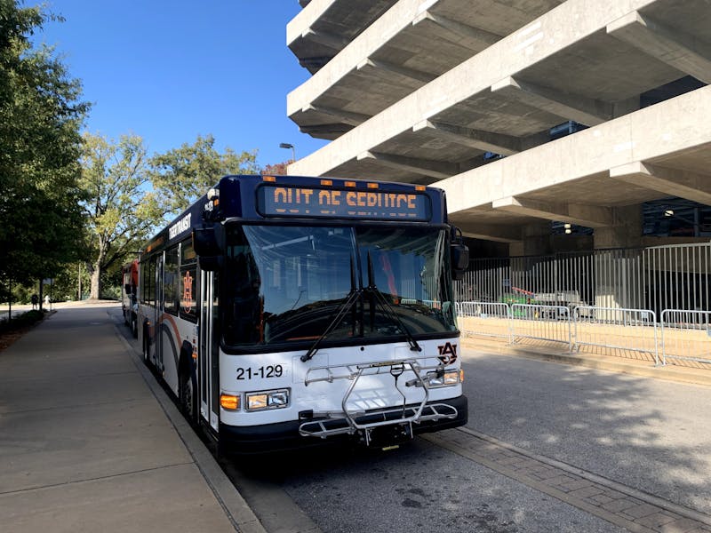 A Tiger Transit bus sits at the Student Center Loop with its "Out of Service" banner on.