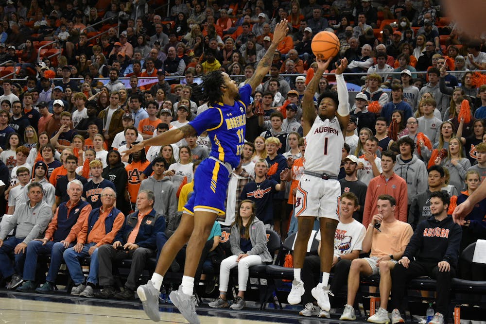 <p>Nov. 9, 2021; Wendell Green Jr. (1) shoots the ball in a game against Morehead State from Auburn Arena in Auburn, Ala.</p>