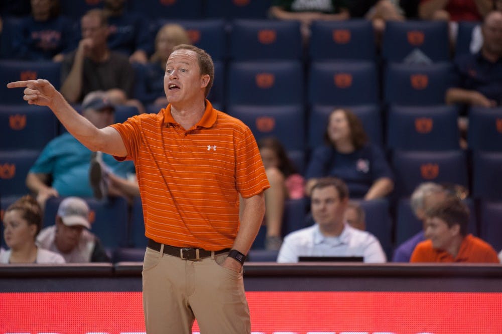 <p>Auburn volleyball coach Rick Nold gives direction to his players during the Tigers match against Samford University at the Auburn Arena on Saturday, Aug. 29, during the War Eagle Invitational. </p>