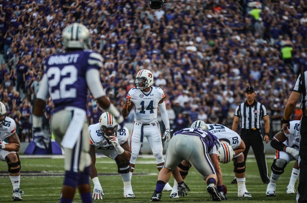 Nick Marshall prepares to take a snap at Kansas State Thursday night.

Raye May / PHOTO EDITOR