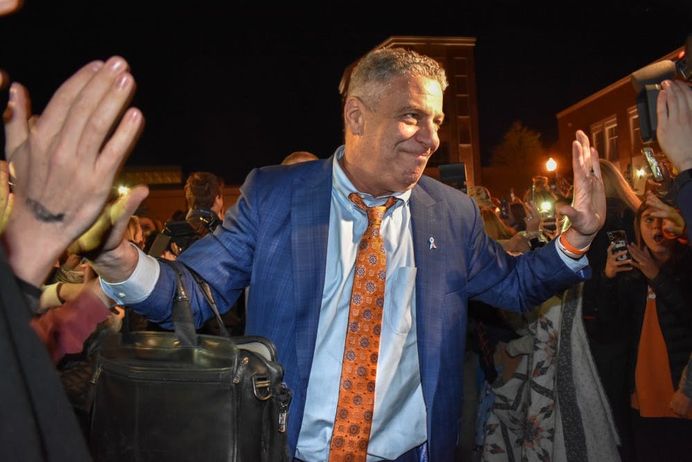 <p>Bruce Pearl greets fans on Sunday, April 1, 2019, in Auburn, Ala.</p>