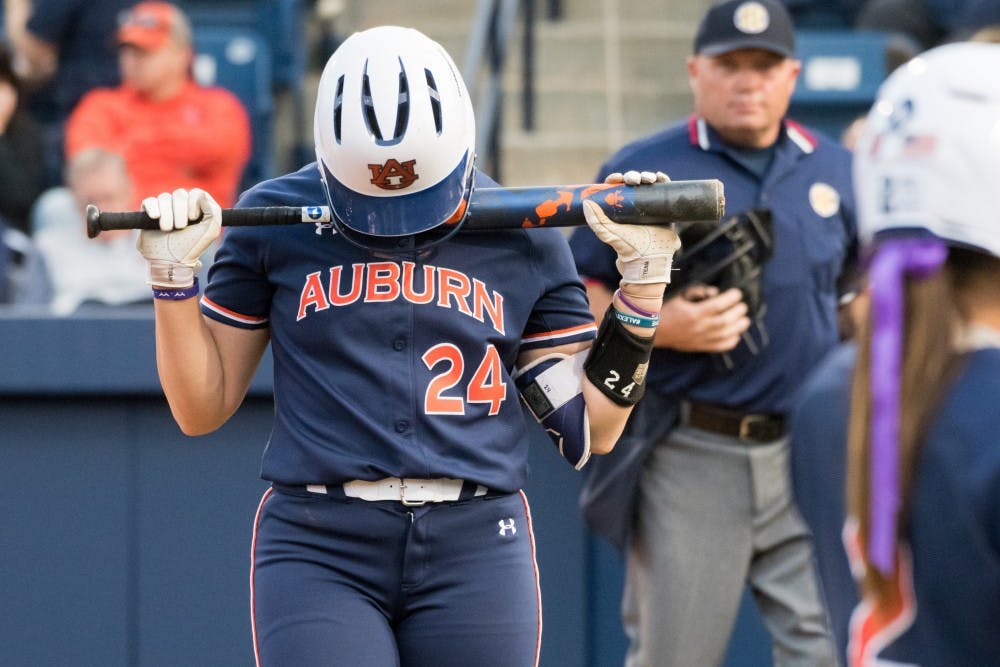 Kendall Veach (24) returns from the plate during Auburn softball vs. Arkansas on Saturday, April 21, 2018, in Auburn, Ala.