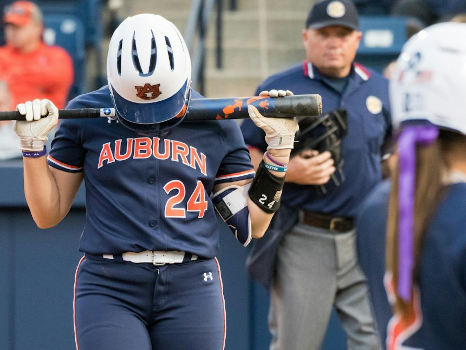 Kendall Veach (24) returns from the plate during Auburn softball vs. Arkansas on Saturday, April 21, 2018, in Auburn, Ala.