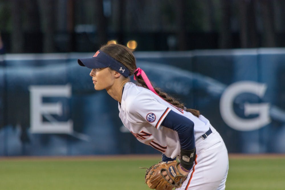 Auburn infielder Casey McCrackin (11) crouches waiting for the pitch during Auburn softball vs Kentucky on Friday, March 23, 2018.