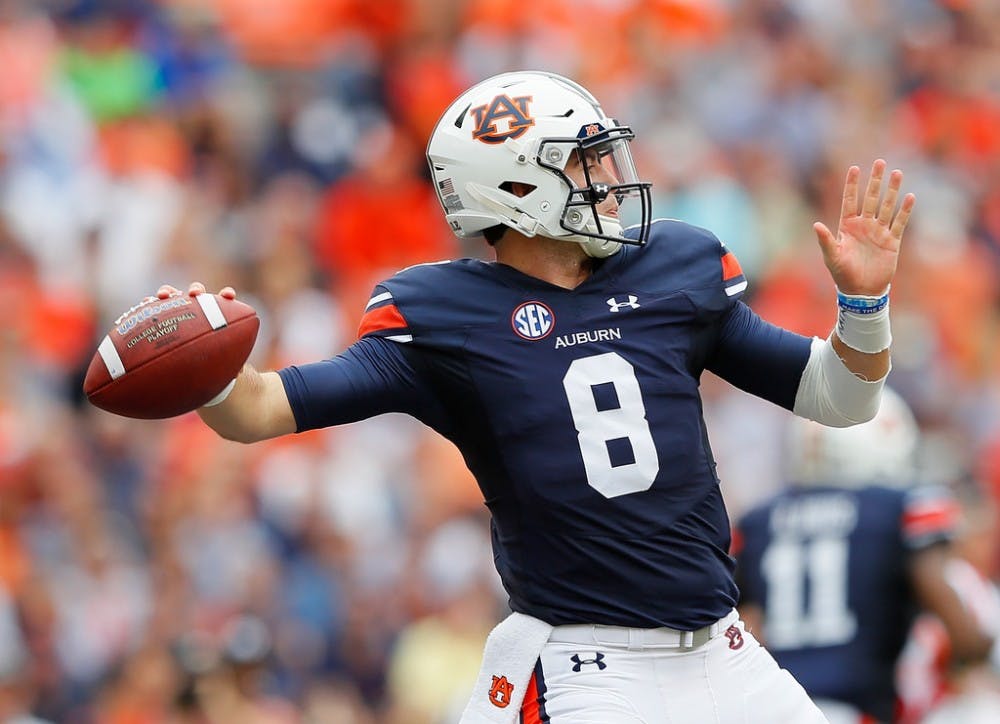 Jarrett Stidham #8 of the Auburn Tigers looks to pass against the Mississippi Rebels at Jordan Hare Stadium on October 7, 2017 in Auburn, Alabama.