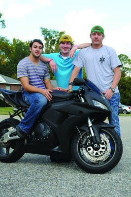 Zaid Kayyali, sophomore in international business, Brandon Batchelor and Seth Clayton plan to travel 12,000 miles across the U.S. to raise funds for the American Cancer Society. (Christen Harned / ASSISTANT PHOTO EDITOR)