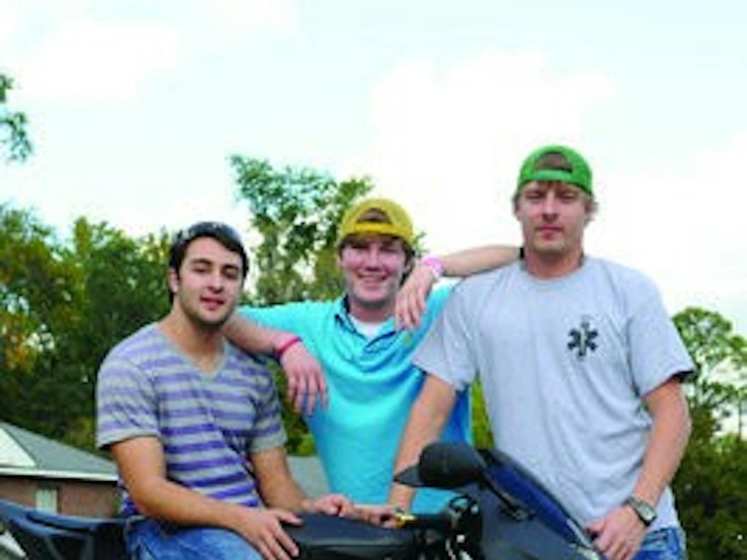 Zaid Kayyali, sophomore in international business, Brandon Batchelor and Seth Clayton plan to travel 12,000 miles across the U.S. to raise funds for the American Cancer Society. (Christen Harned / ASSISTANT PHOTO EDITOR)