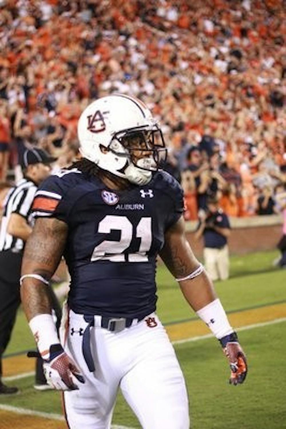 Tre Mason after his 11-yard touchdown run in the third quarter. (Jenna Burgess / ASSOCIATE PHOTO EDITOR)