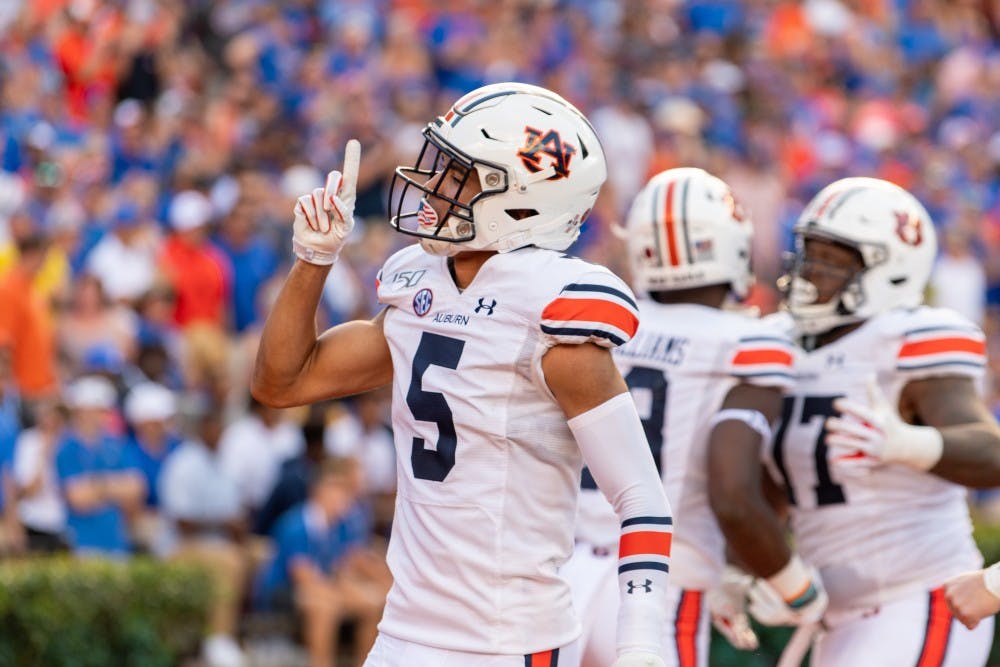 <p>Anthony Schwartz (5) celebrates following a touchdown during Auburn vs. Florida, on Saturday, Oct. 5, 2019, in Gainesville, Fla.</p>