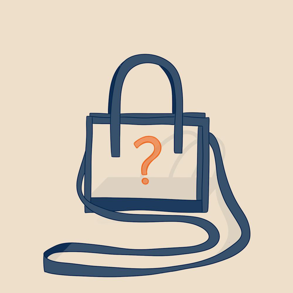 <p>A graphic of a clear, blue bag with an orange question mark on it to represent what you should bring to football games.</p>