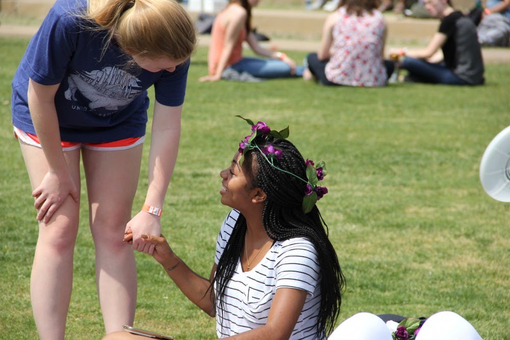 Students taking a break on the Green Space at the UPC Spring Fling,&nbsp;on Wednesday, April 19, 2017 in Auburn, Ala.