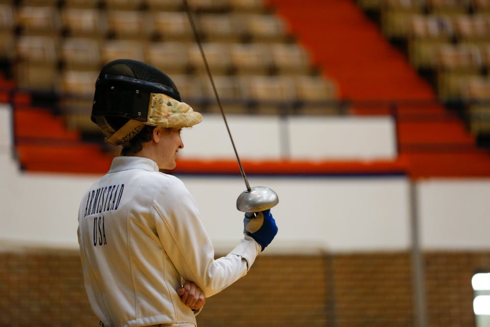 <p>A member of the Auburn University Fencing Club prepares for a match.</p>