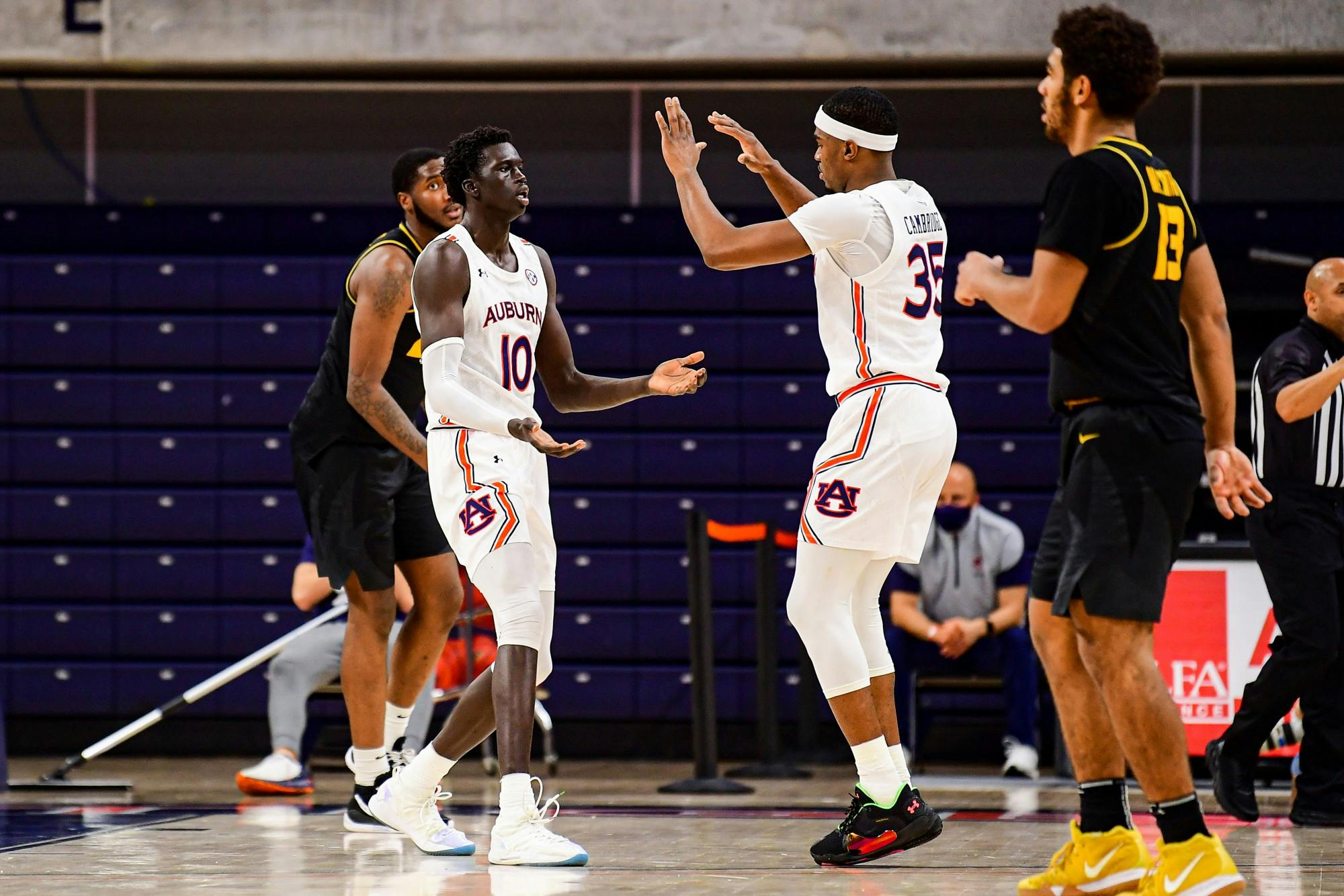 012621_Auburn_20210126 SL1_8555_Devan Cambridge reacts with JT Thor.jpg