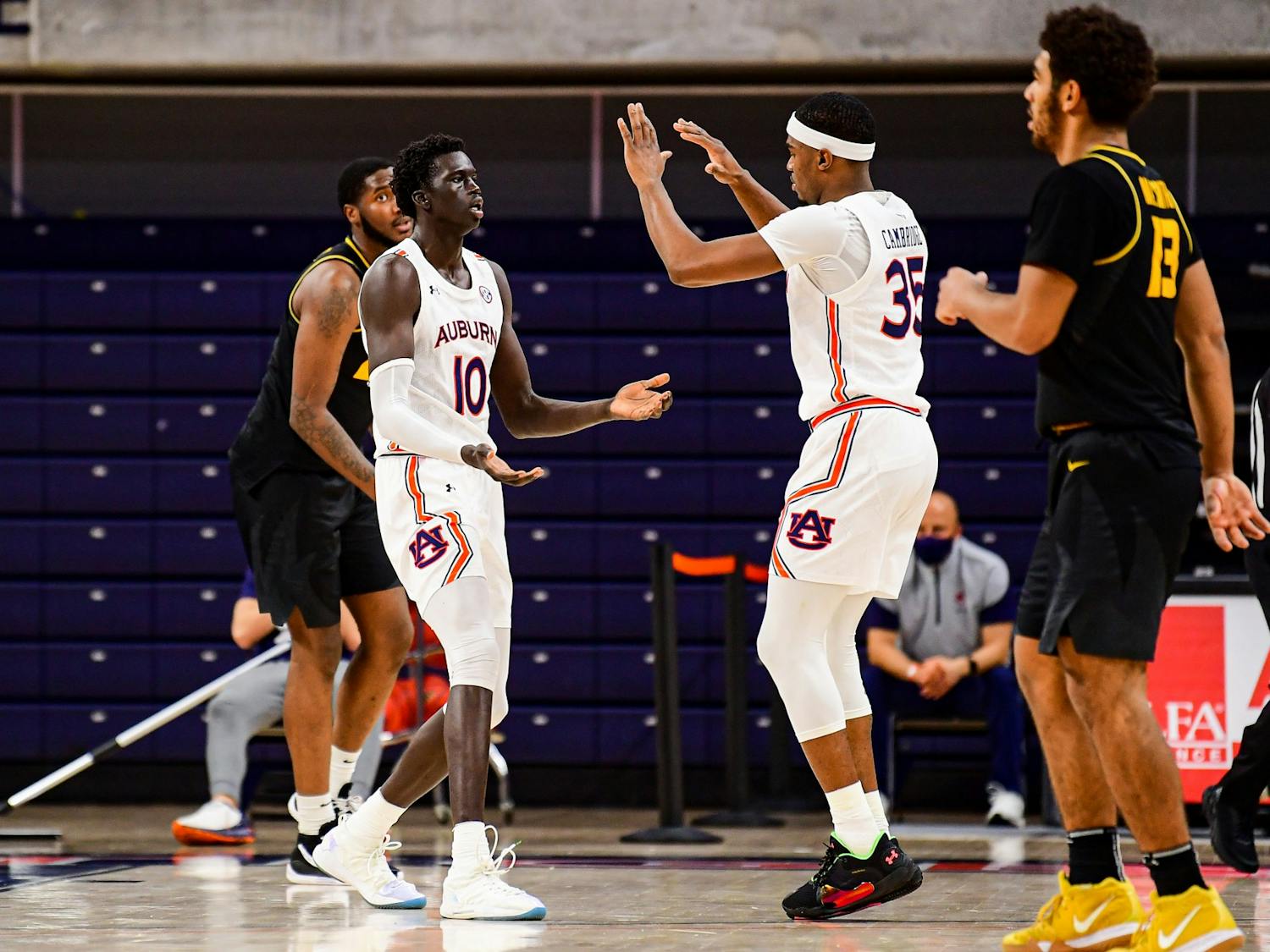 012621_Auburn_20210126 SL1_8555_Devan Cambridge reacts with JT Thor.jpg