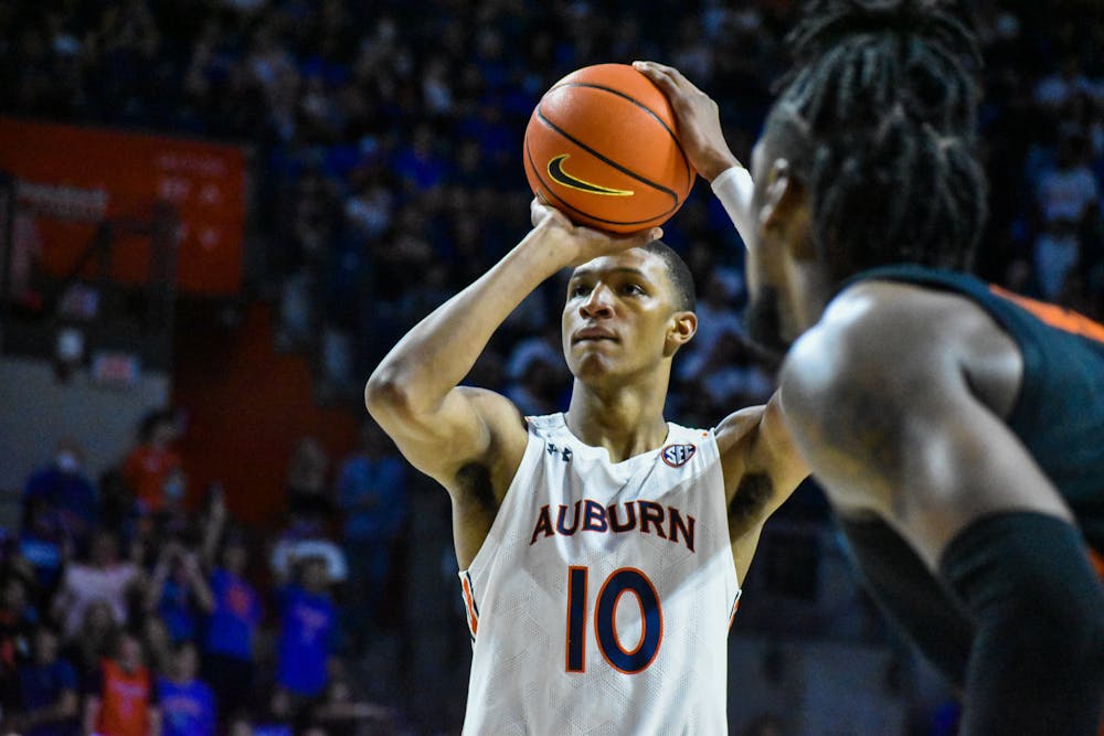 <p>Jabari Smith (10) takes the first of a pair of free throws during a match between Auburn and Florida in the Stephen C. O'Connell Center on Feb, 19, 2022, in Gainesville, Fla.&nbsp;</p>