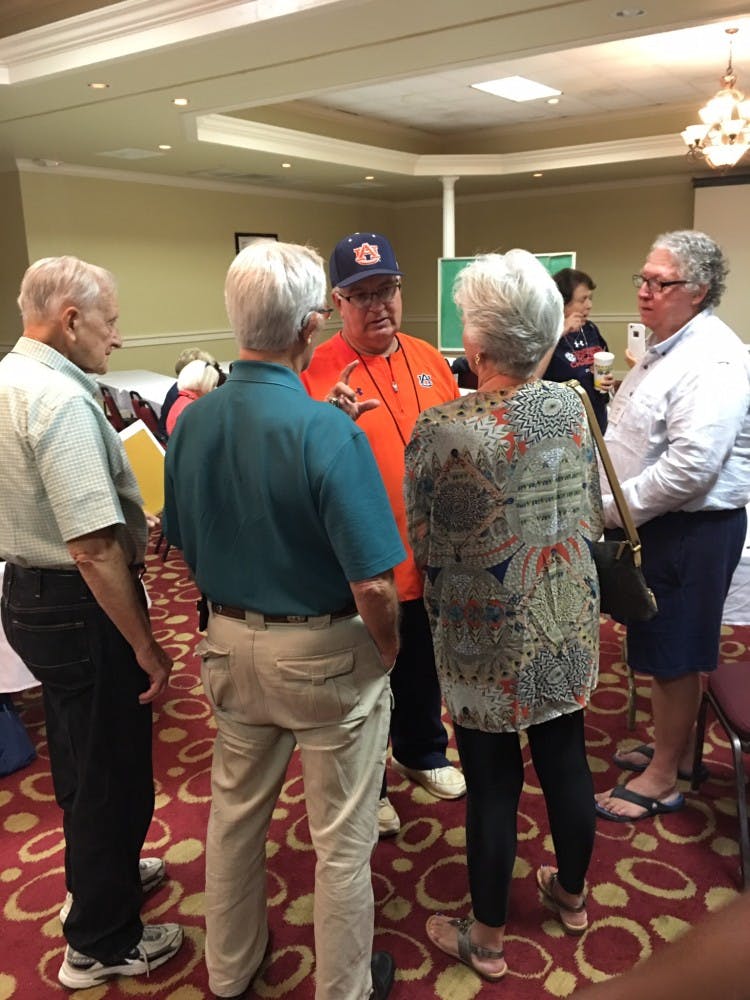 Softball coach Clint Myers speaks to attendees of the OLLI lunch and learn. (Liz Maddux | Community Writer)