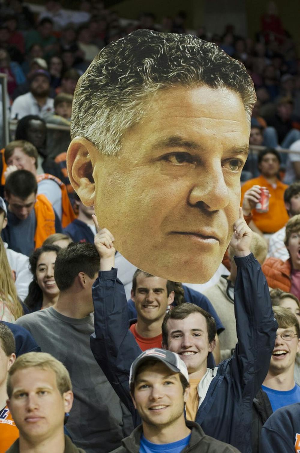 A student holds up a cutout of Bruce Pearl's head Tuesday night at the press conference.

Raye May / DESIGN EDITOR