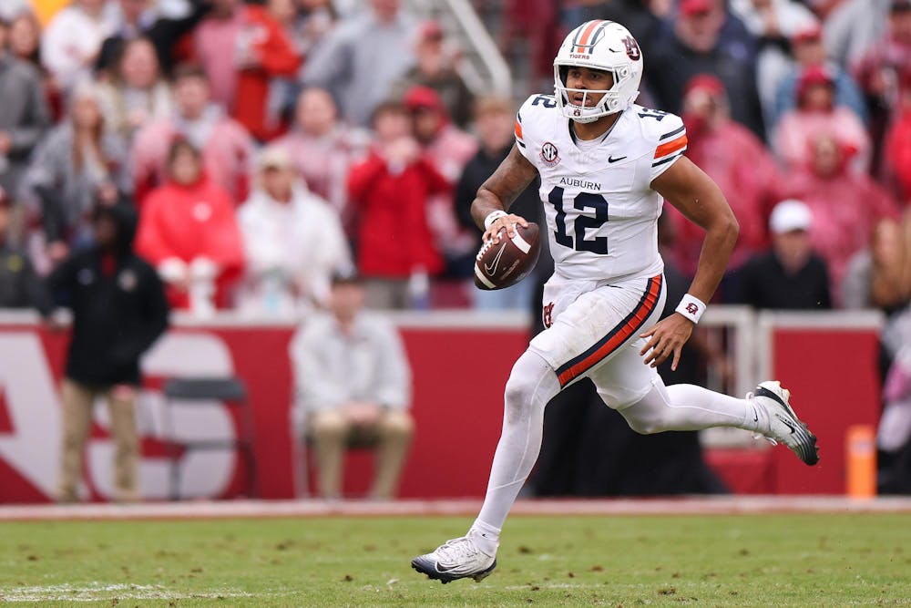 FAYETTEVILLE, AR - OCTOBER 25 - Auburn quarterback Ashton Daniels (12) - Auburn Tigers vs. Arkansas Razorbacks at Donald W. Reynolds Razorback Stadium in Fayetteville, AR on Saturday, Oct. 25, 2025.

Photo by David Gray/Auburn Tigers