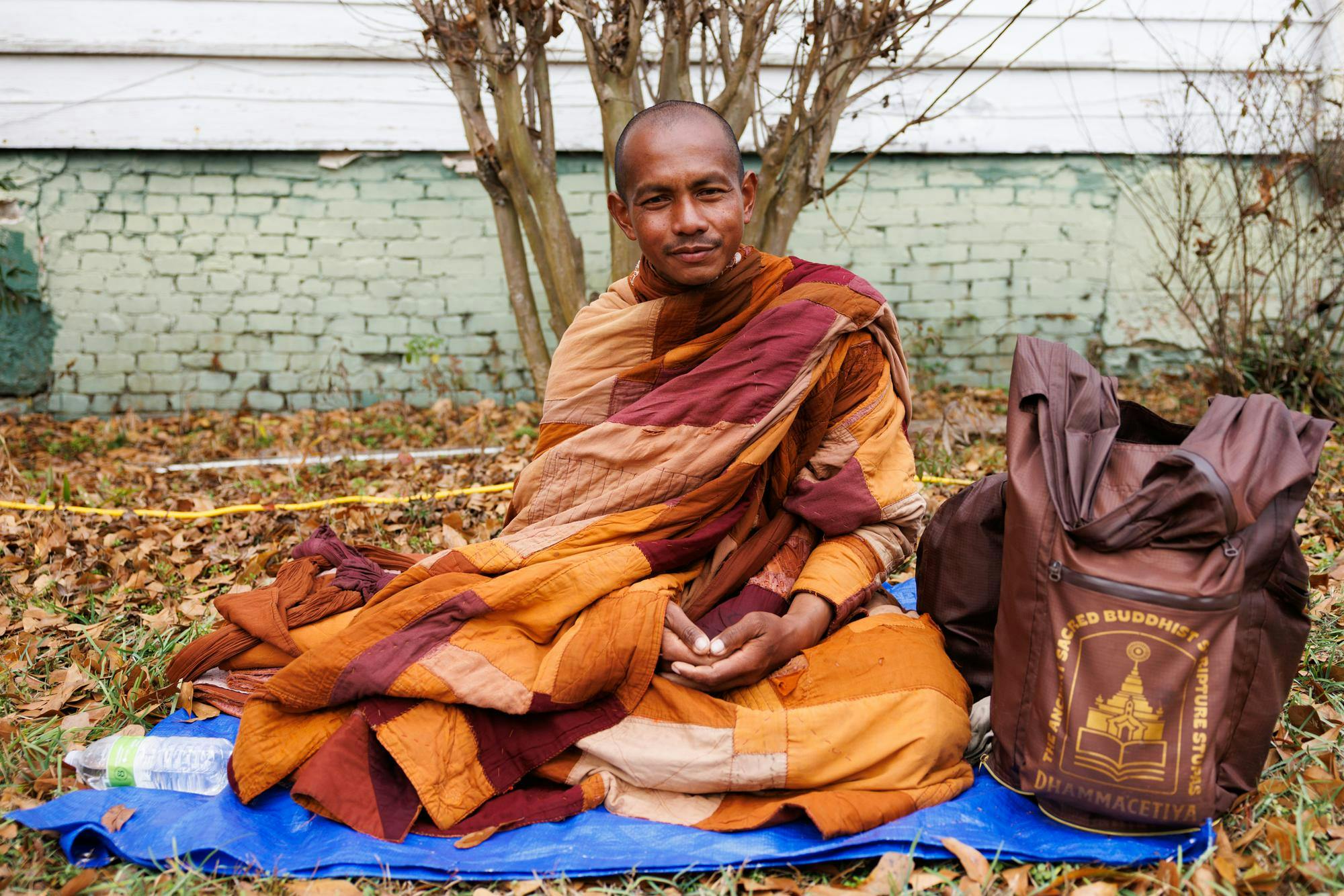 A venerable monk poses for his portrait during the lunch stop in Cusseta, Ala. after walking from Opelika on Dec. 26, 2025.