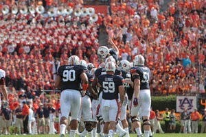 Kicker Cody Parkey was lifted up by the Tigers after kicking the winning field goal in overtime against ULM. (Rebecca Croomes / PHOTO EDITOR)