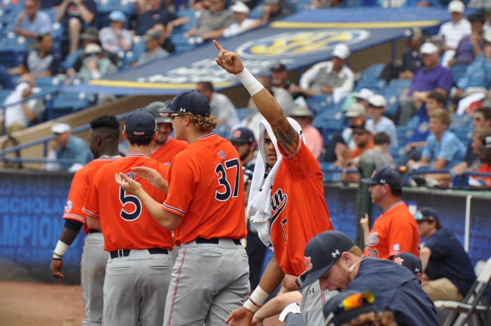 Will Holland celebrates&nbsp;during Auburn Baseball vs. Ole Miss on Tuesday,May. 23, 2018 in Hoover, Ala.