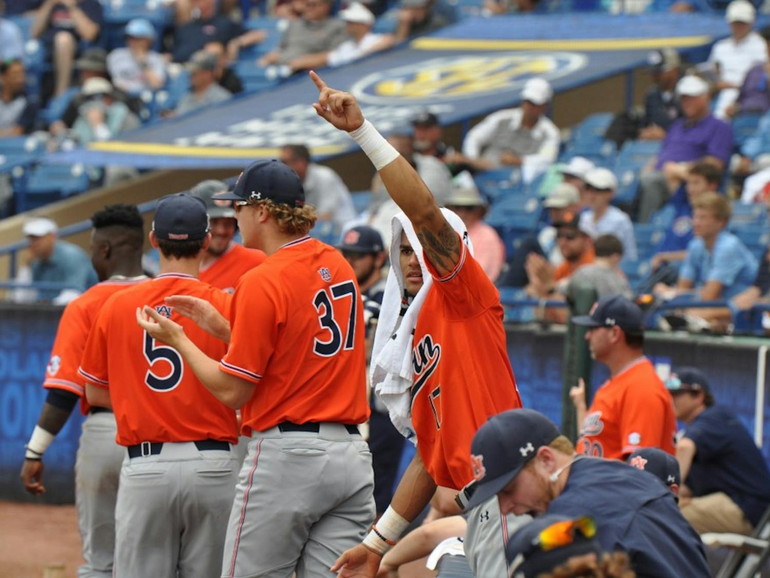 Will Holland celebrates during Auburn Baseball vs. Ole Miss on Tuesday,May. 23, 2018 in Hoover, Ala.