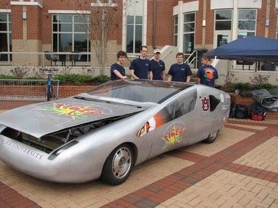 Members of the Sol of Auburn team pose next to TIGER, the solar-biodiesel hybrid car, outside the Student Center in February. From left to right: Dusten Doggett, Paul Poland, Josh Barron, Seth Fincher and Joe Berry. (Contributed by Sushil Bhavnani)