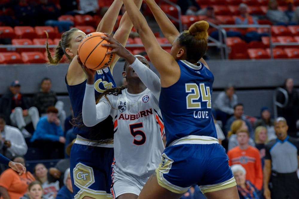 Aicha Coulibaly (#5) attempts to layup the ball in a match against Georgia Tech at Neville Arena on November 16th, 2022