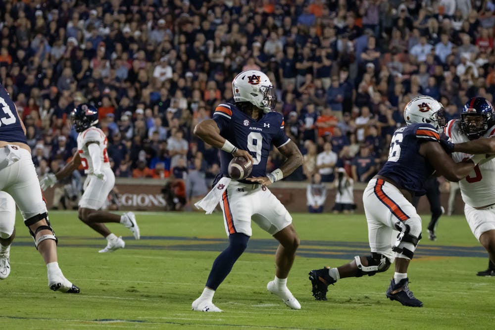 <p>Robby Ashford (#9) winds up for a throw versus Ole Miss in Jordan-Hare stadium on October 21st, 2023.</p>