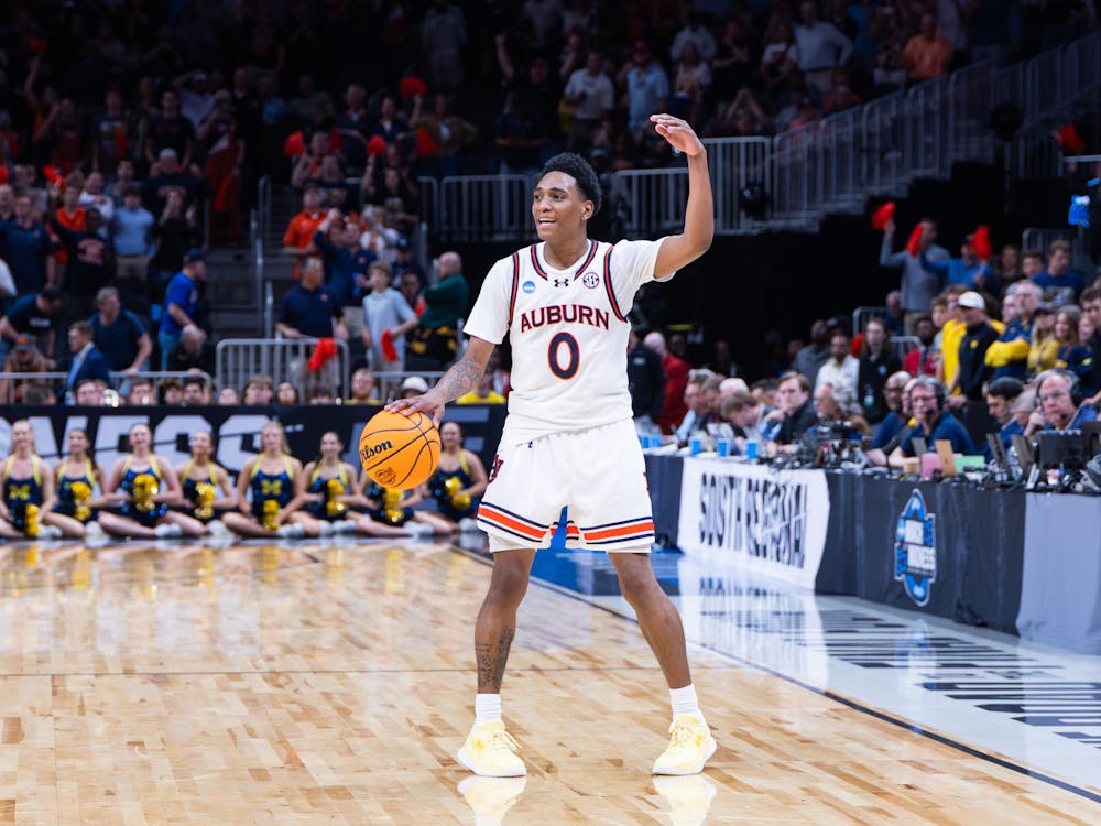 Tahaad Pettiford celebrates the final seconds of Auburn's win vs Michigan in the Sweet Sixteen on March 28, 2025.