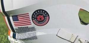 The helmet decal displays the Auburn logo surrounded by the stars and stripes as well as the words "A spirit that is not afraid, Military Appreciation Day." (Courtesy of Todd Van Emst)