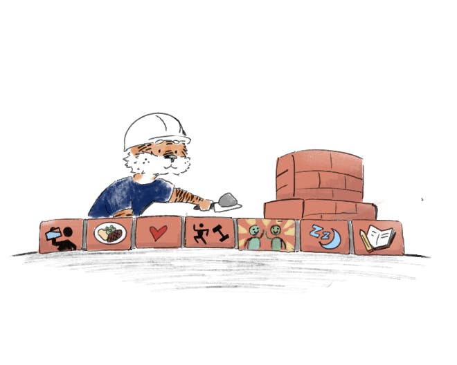 A tiger working with iconed bricks.