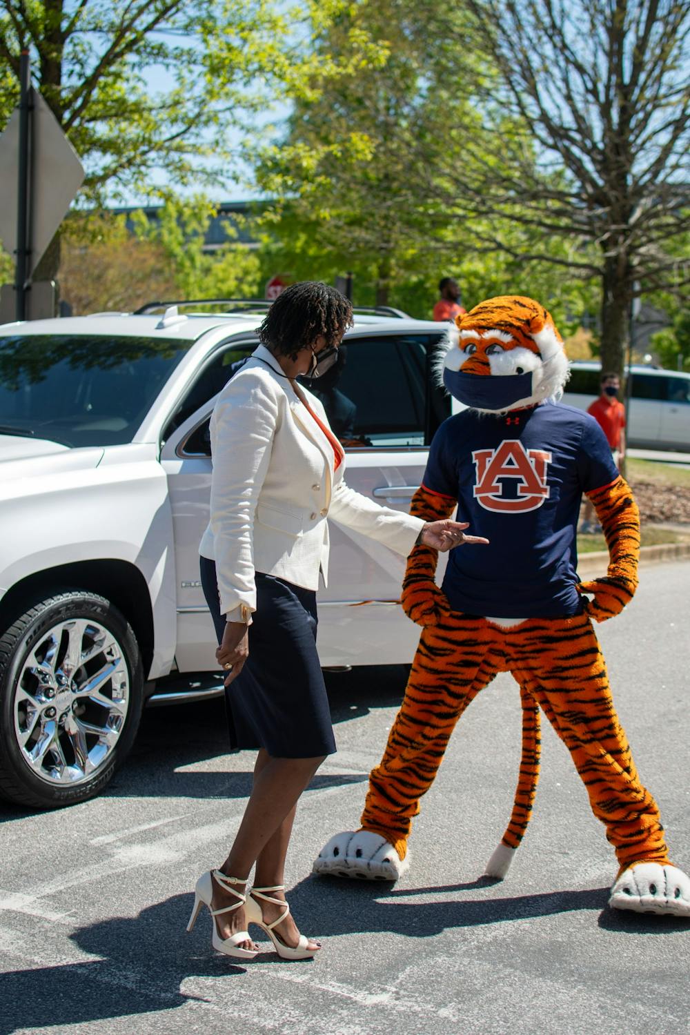 Johnnie Harris the new Auburn Women's Basketball coach talks with Aubie prior to her formal introduction ceremony on Monday, April 5, 2021, in Auburn, Ala. 