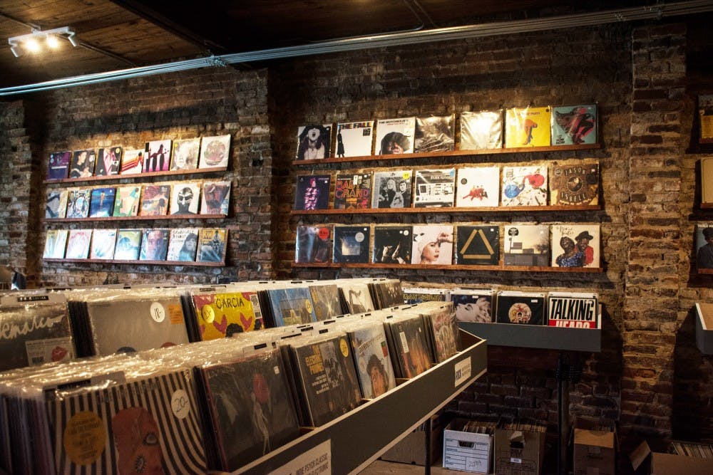 Records line the walls at 10,000 Hz Record store in Opelika, Ala. on Tuesday, Aug. 21.