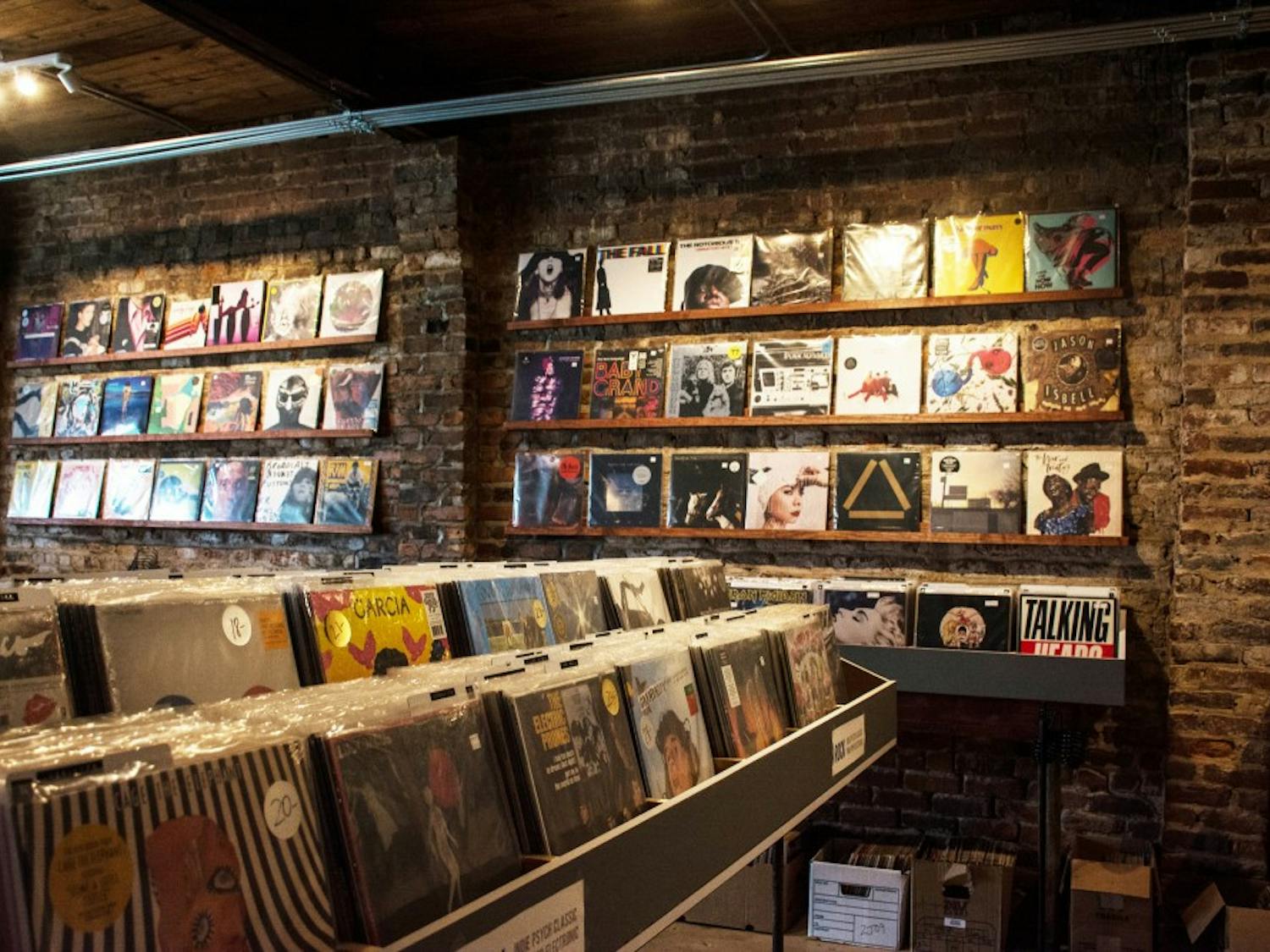 Records line the walls at 10,000 Hz Record store in Opelika, Ala. on Tuesday, Aug. 21.