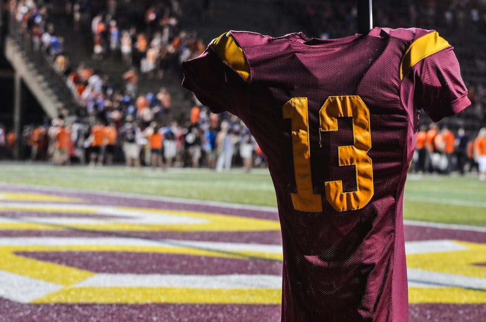 Philip Lutzenkirchen's high school jersey was placed in the end zone spot where his famous tip to his teammate occurred.

Raye May / PHOTO & DESIGN EDITOR