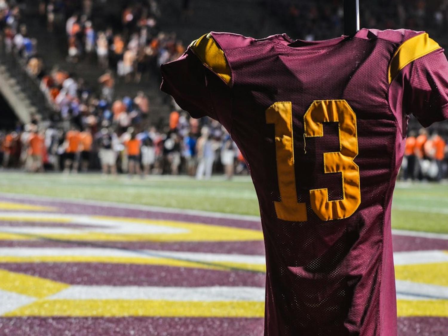 Philip Lutzenkirchen's high school jersey was placed in the end zone spot where his famous tip to his teammate occurred.
Raye May / PHOTO & DESIGN EDITOR