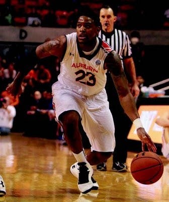 Frankie Sullivan drives to the rim against DePaul on Nov. 30,
2012. (Rebecca Croomes / PHOTOGRAPHER)