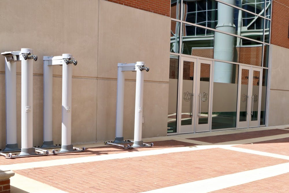 Metal Detectors are positioned outside of Jordan Hare Stadium ready for the football season on Sept. 3, 2019, in Auburn, Ala. 