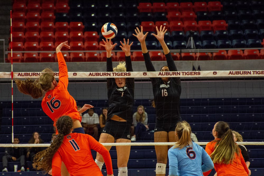 <p>Nov. 10, 2021; Val Green (16) hits the ball over the net during a match against South Carolina from Auburn Arena in Auburn, Ala.</p>