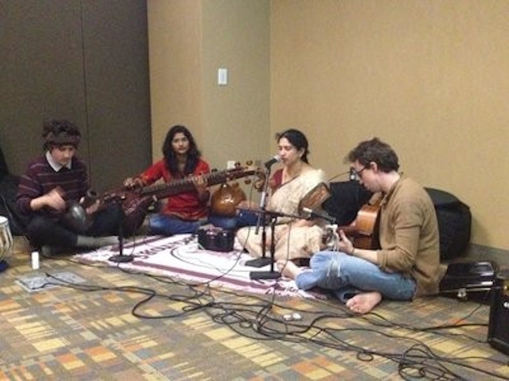 Sam Price, Rasika Ramesh, Chaitra Gururaj and Zach Watson play Indian folk music.
(Becky Hardy | Campus Editor)