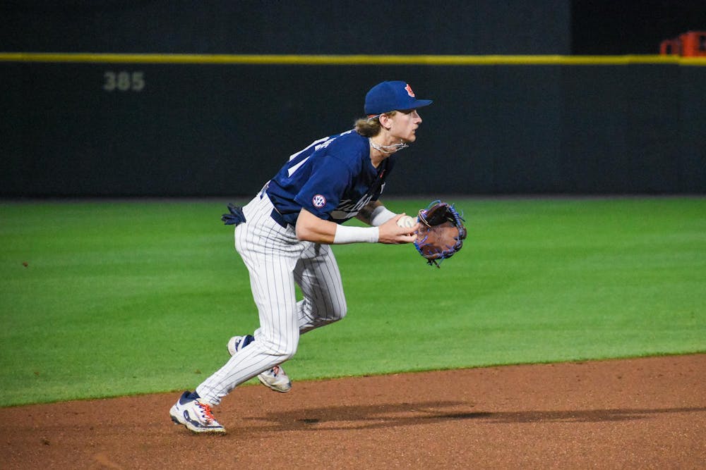 <p>Brandon McCraine (11) catches a ground ball against Samford in Plainsman Park in Auburn, AL on March 3, 2025.</p>