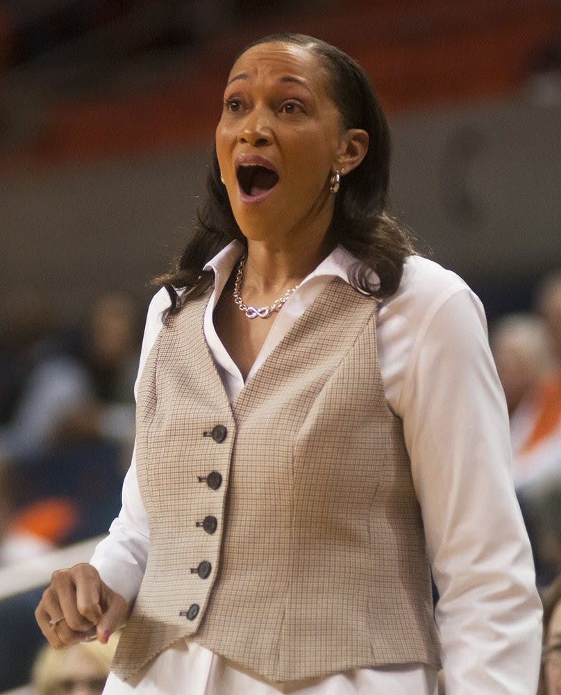 Auburn Head Coach Terri Williams-Flournoy laughs at a foul call against Auburn, Jan. 12, 2014. (Zach Bland / Assistant Photo Editor)