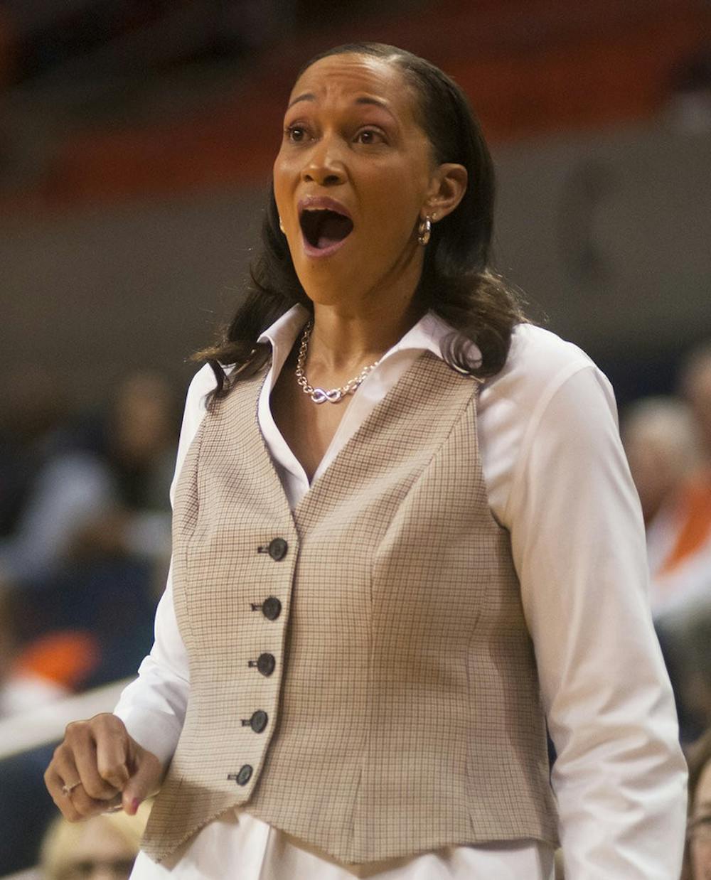 Auburn Head Coach Terri Williams-Flournoy laughs at a foul call against Auburn, Jan. 12, 2014. (Zach Bland / Assistant Photo Editor)