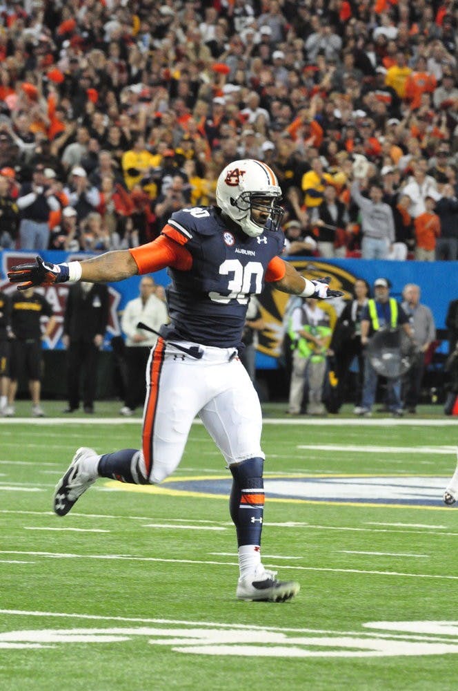 Dee Ford celebrates on field. Anna Grafton / PHOTO EDITOR