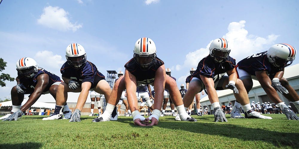 Linemen from left, Greg Robinson, Alex Kozan, Reese Dismukes, Christian Westerman and Chad Slade work on special teams Wednesday.Auburn football first day of practice on Wednesday, Aug. 1, 2012 in Auburn, Ala.Todd Van Emst 