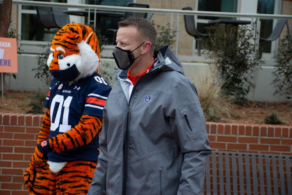 <p>Head coach Bryan Harsin poses for a picture with Aubie on the Haley Concourse on Monday, Feb. 1, 2021, in Auburn, Ala.&nbsp;</p>