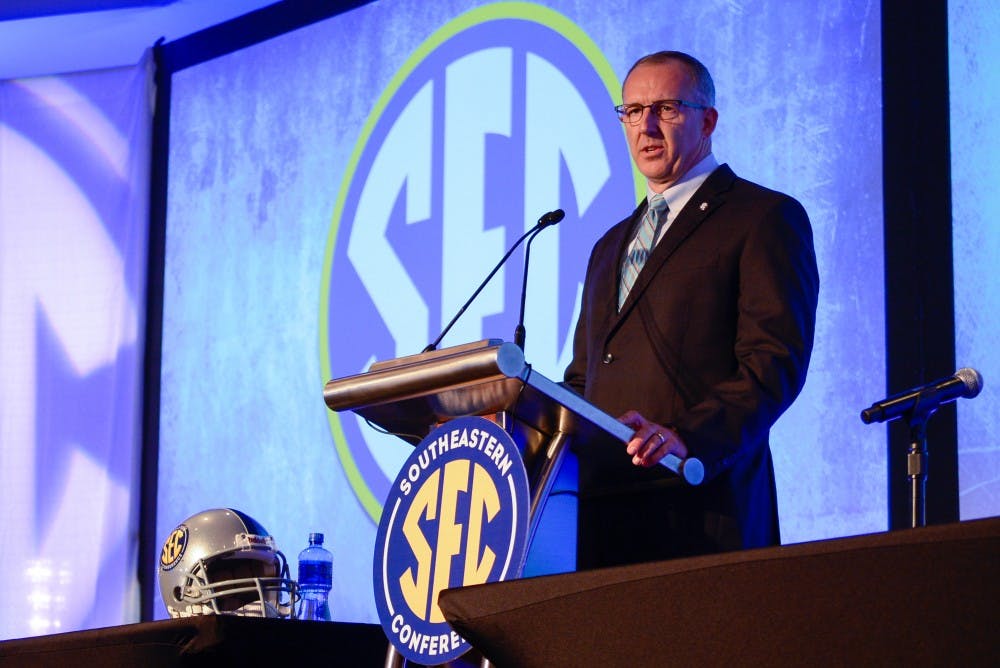 <p>The new SEC Commissioner, Greg Sankey, answers questions from the press at the SEC Media Day 2015 in Hoover, Alabama on Monday, July 13, 2015. </p>
