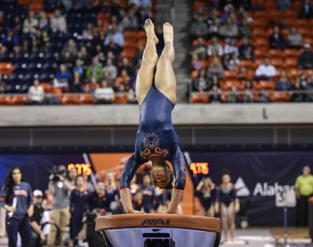 A'Miracal Phillips performs on vault during Auburn vs Arkansas gymnastics on Friday, Feb. 3, 2017, in Auburn, Ala.
